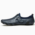 Chaussure de conduite homme à bride coloris bleu marine, vue de profil