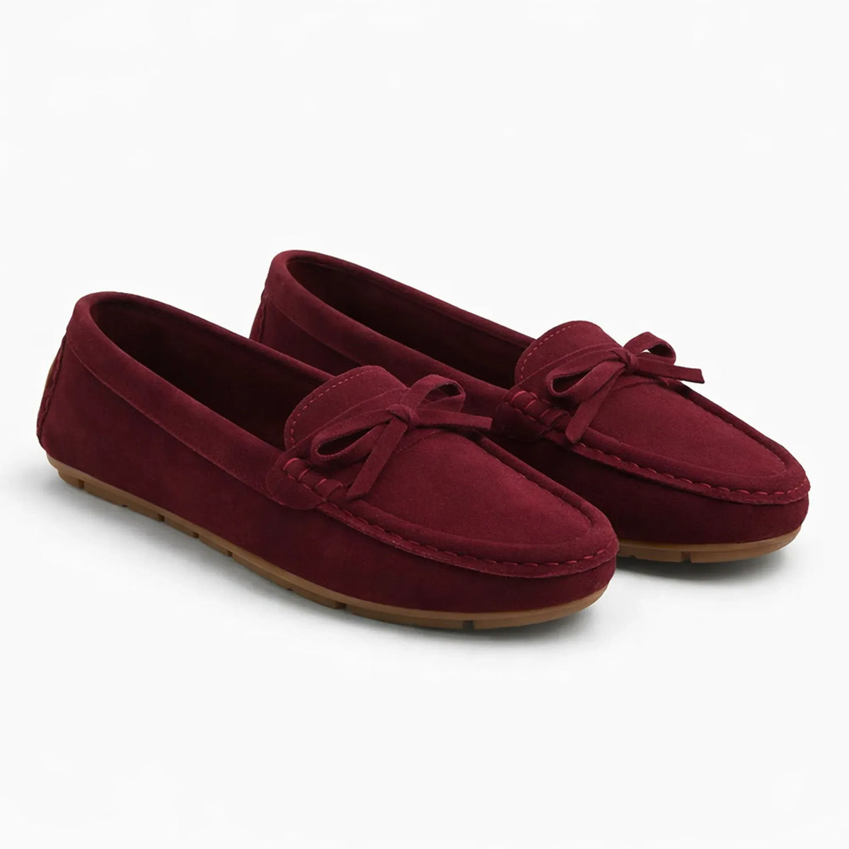 chaussures bordeaux femme vues de trois quarts sur fond uni
