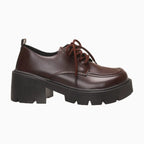 mocassin à lacets plateforme coloris marron foncé posé sur fond clair