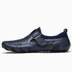 Mocassin ajouré homme à bride coloris bleu, vue de profil