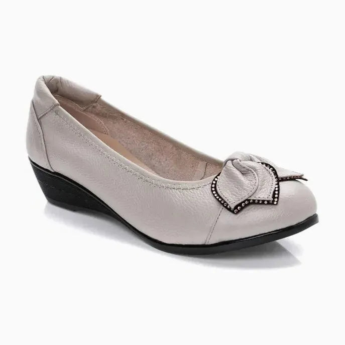 paire seule coloris beige, vue latérale droite sur fond uni