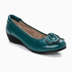 paire seule coloris vert canard, posée sur fond uni