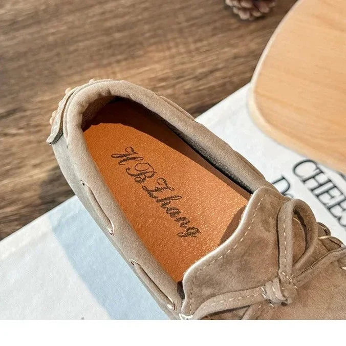 zoom sur l’intérieur du mocassin kaki montrant la semelle