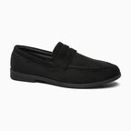 mocassin penny noir photographié seul sur fond clair