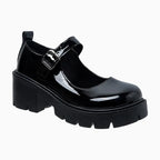 Mocassin vernis noir femme à semelle épaisse avec bride et boucle argentée