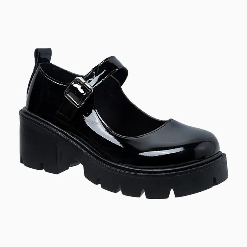 Mocassin vernis noir femme à semelle épaisse avec bride et boucle argentée